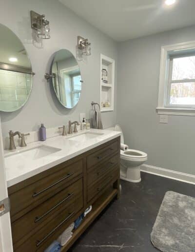 Beautiful solid wood double sink vanity with recessed shelf installed by MM Home Improvements in Berwyn