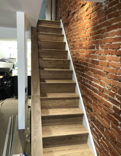 Newly constructed stairs by MM Home Improvements in an old building in Philadelphia.